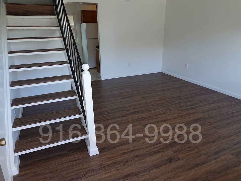 Living room with open staircase