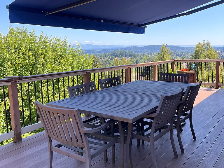 Large deck with view of the Cascades and retractable awning
