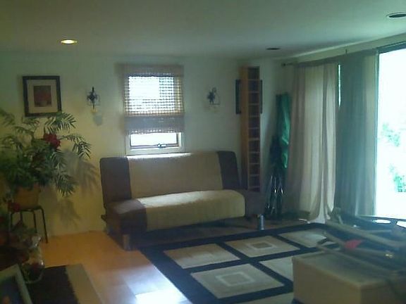 Family Rm on lower level that offers sliders to rear of home/back yard.