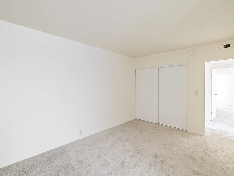 Comfortably tucked away for added privacy, Bedroom C offers a peaceful retreat with ample space to unwind.