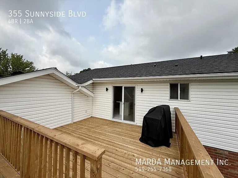 355 Sunnyside Blvd — Photo 22