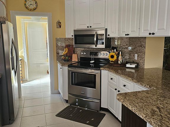 4th image of 7664 Pine Island Way
