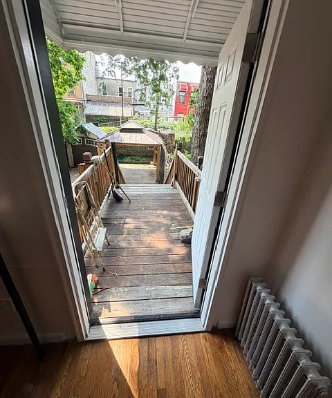 Out to your private upper deck-down the stairs to a shared backyard with a SINGLE person in downstairs apt