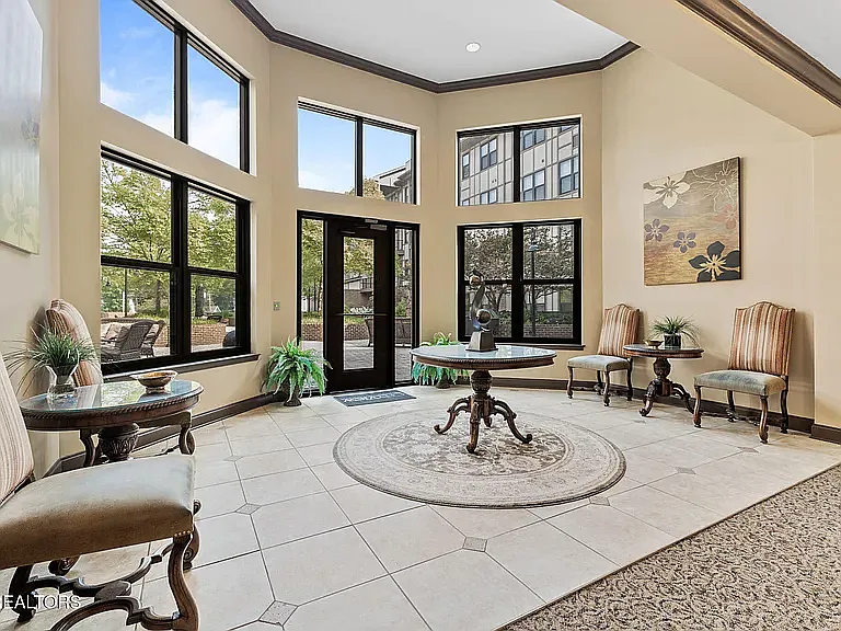 entrance to patio with a grill