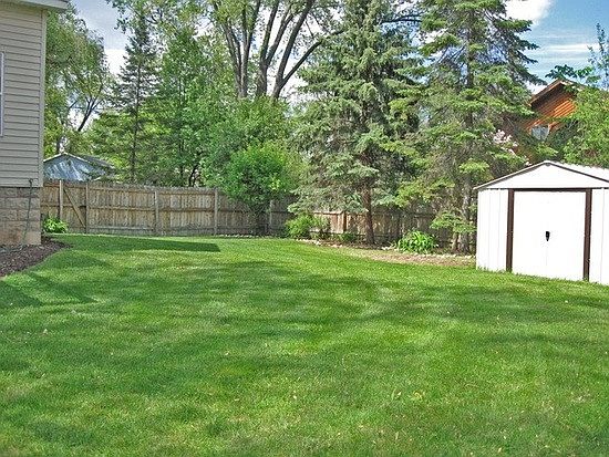 fenced yard with shed