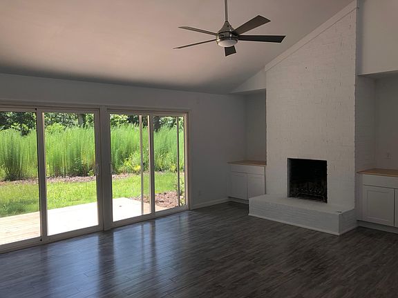 Living Room w/ Wood burning Fireplace