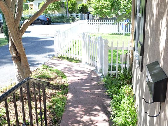 Secure handrails leading down to front yard.