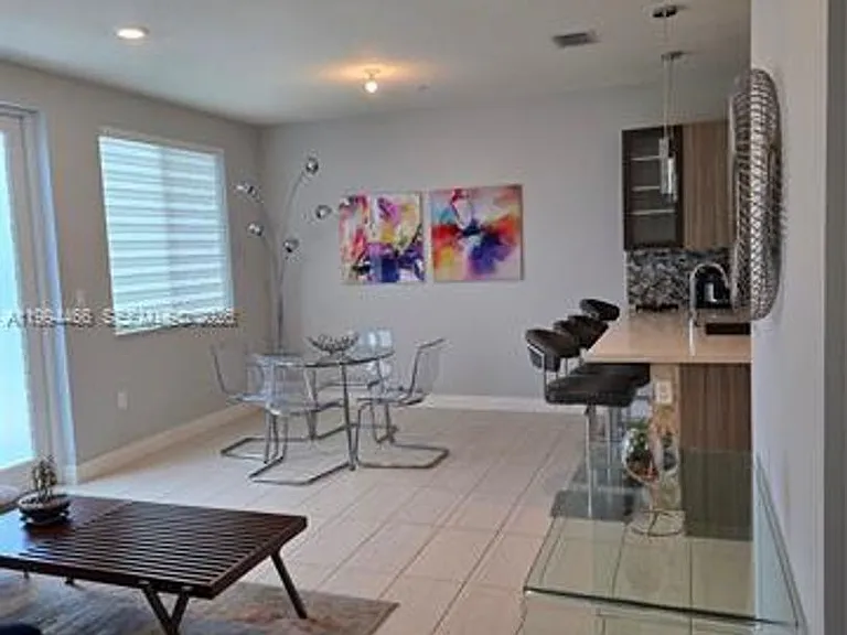 10222 NW 64th Way #302 — Photo 4