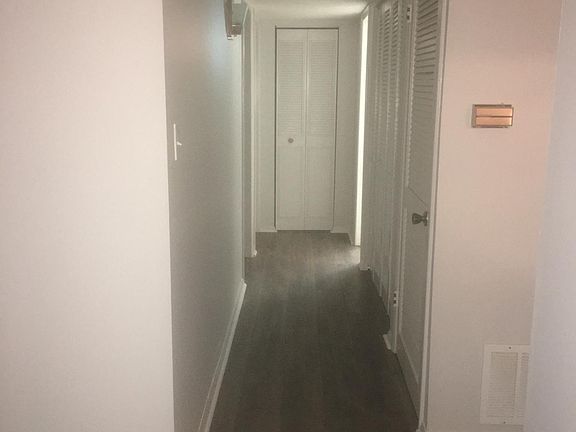 Hallway to bedrooms and bath.