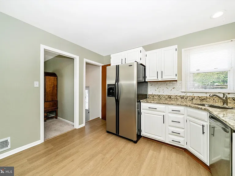 8409 Woodward St — Photo 11
