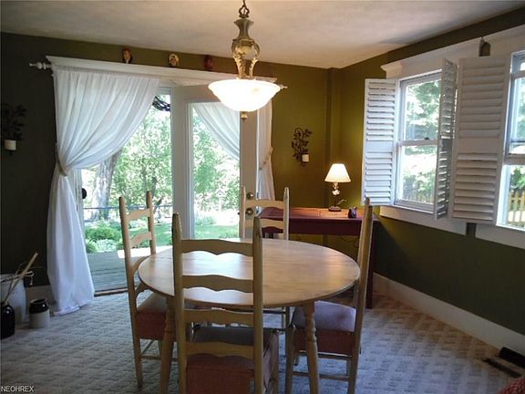 Dining Room with Double Door leading to the Rear Deck.