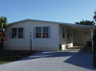 702 Amaryllis Dr, Barefoot Bay, FL 32976