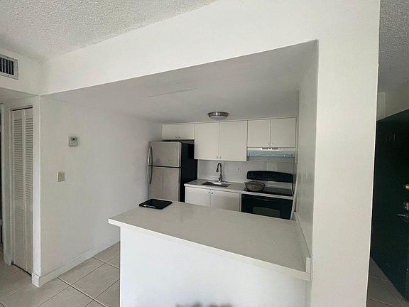 3rd image of 4275 NW South Tamiami Canal Dr APT 311