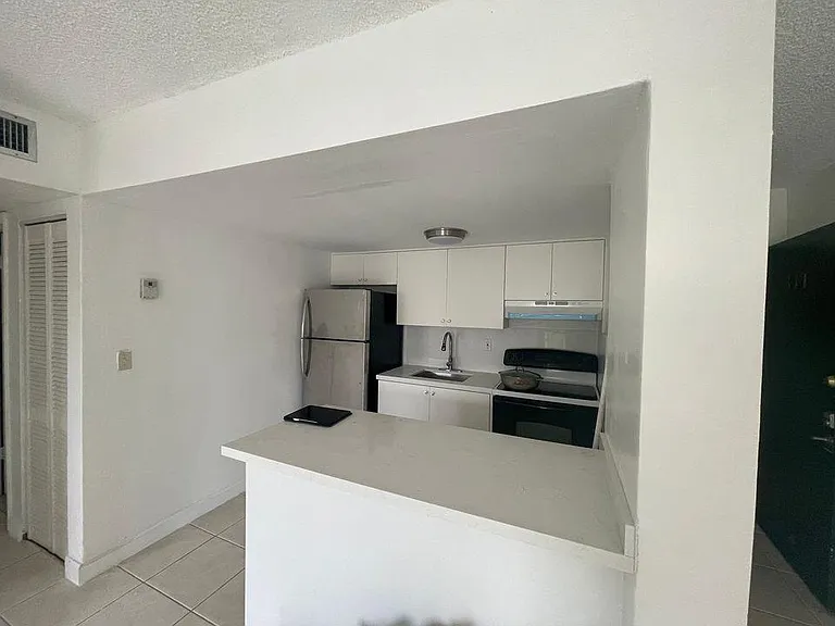 4275 NW South Tamiami Canal Dr #311 — Photo 12
