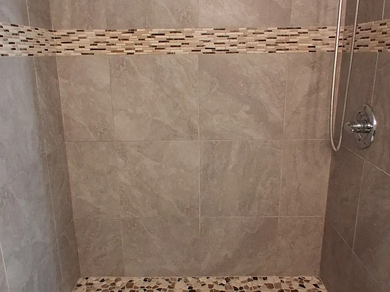Master bathroom with spa-like shower tiles