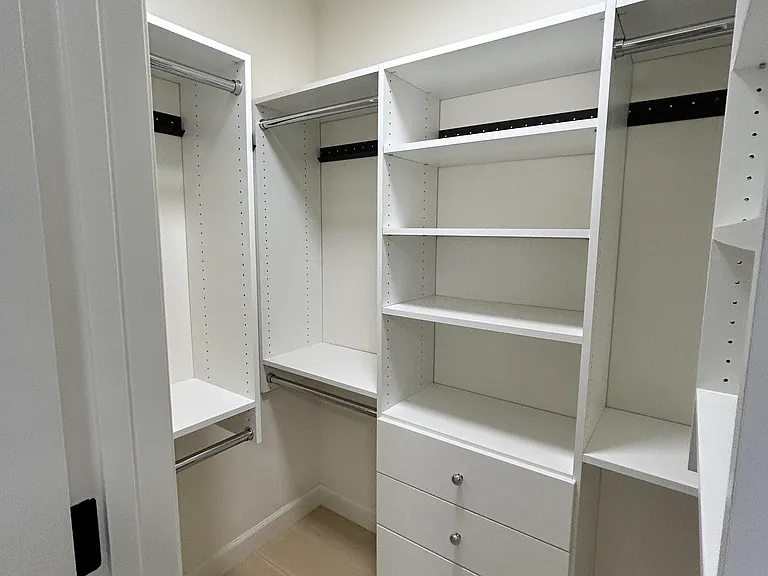small walking closet in the master bedroom