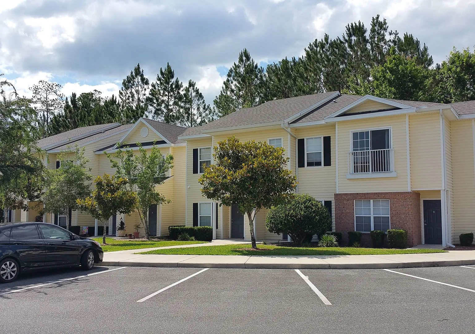 Welcome to your vibrant new lifestyle at Magnolia Place 4340 NW 48th Street #103 — Photo 1