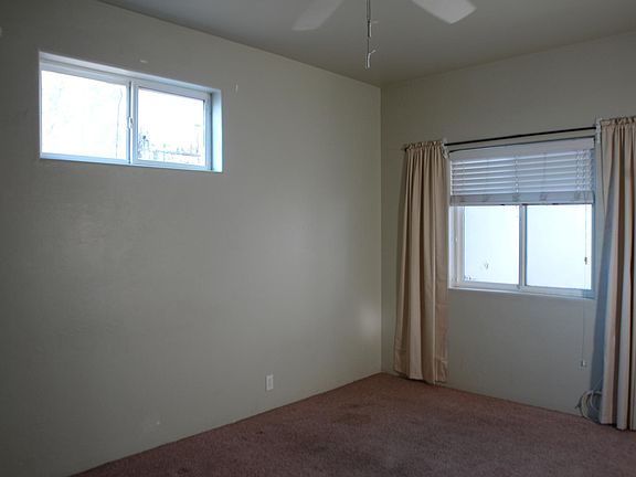 Bedroom with walk in closet