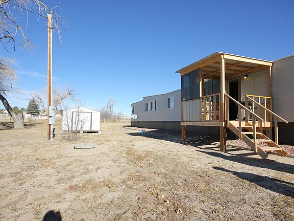 Home on over 1 acre in the town of Falcon, walking distance to King Soopers