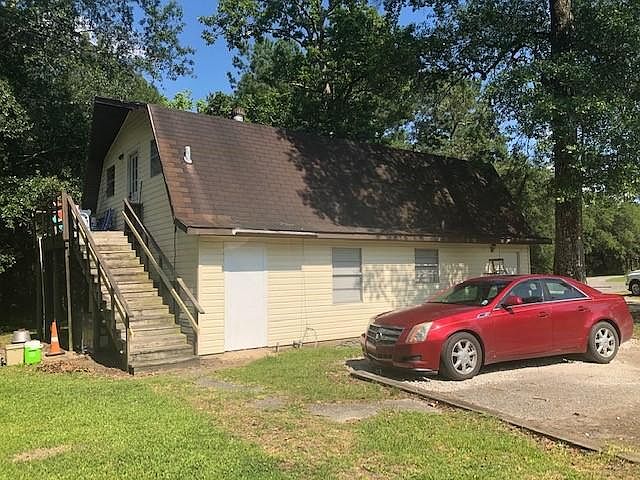 Tons of green space and shade! Apt. 2 is the bottom floor of this 2-story duplex.