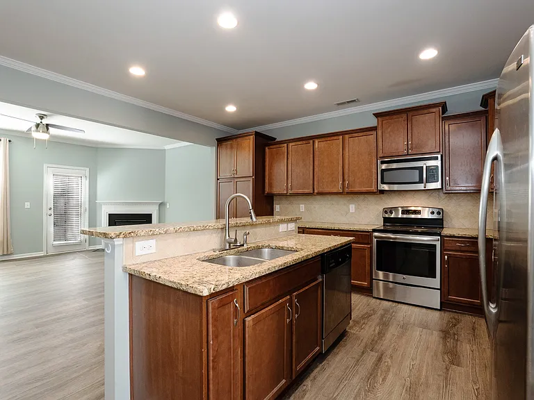 Kitchen with bar top seating