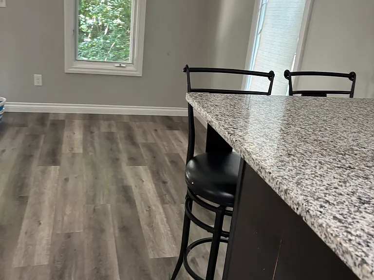 Eat in kitchen flows to living area space