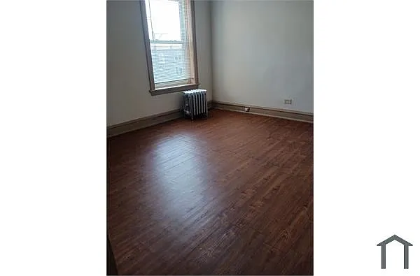 Building Photo - 1134 N Lawler Ave #3W