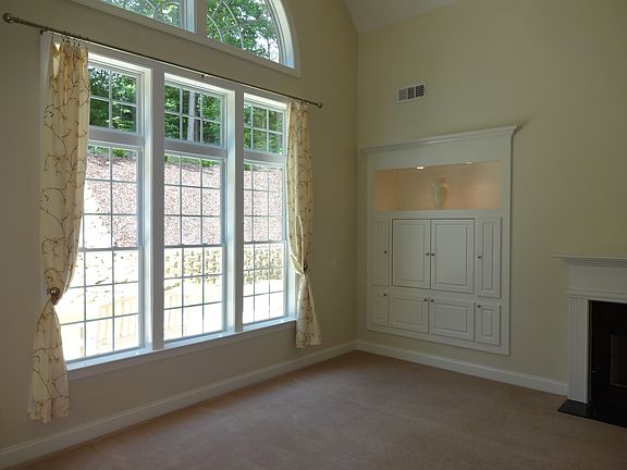 Large windows with private back yard