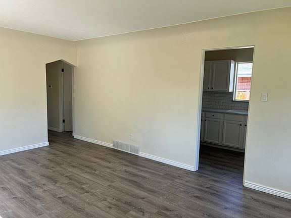 Living room looking into kitchen