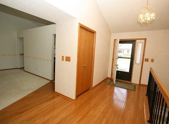 Welcome Foyer w/ hardwood floors.