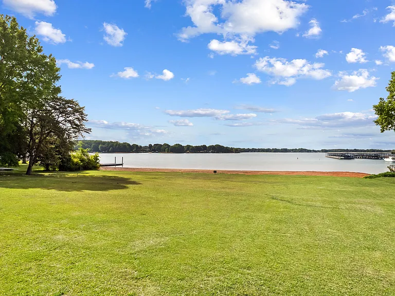Lake access! Private picnic and swim area available only to neighbors! Can put your paddleboards or kayaks in right here!