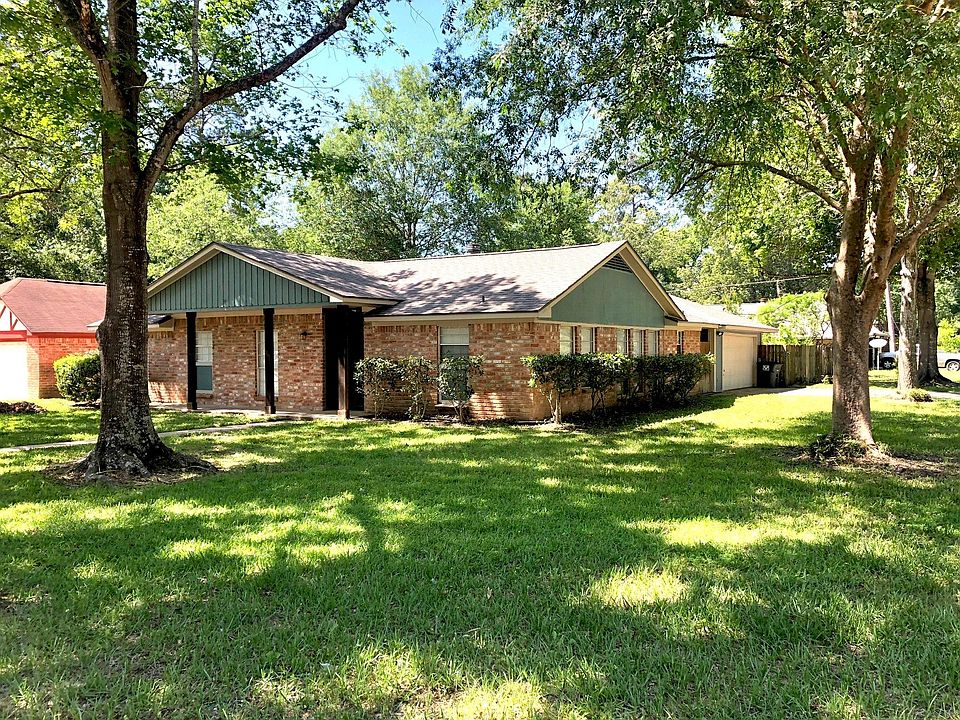 Home sits on oversized lot on quiet street. Property has several mature trees that provide shade.
