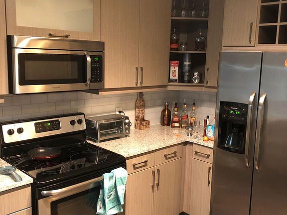 Kitchen with Refrigerator and Oven Tops