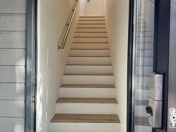 Stairway up to the Penthouse door entrance on the 2nd floor