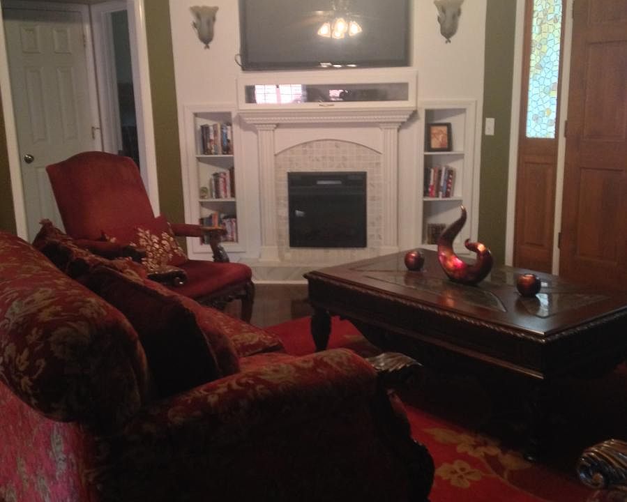 Fire place in living room with 55 inch TV