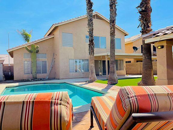 Enjoy the pool and easy maintenance resort style back yard.