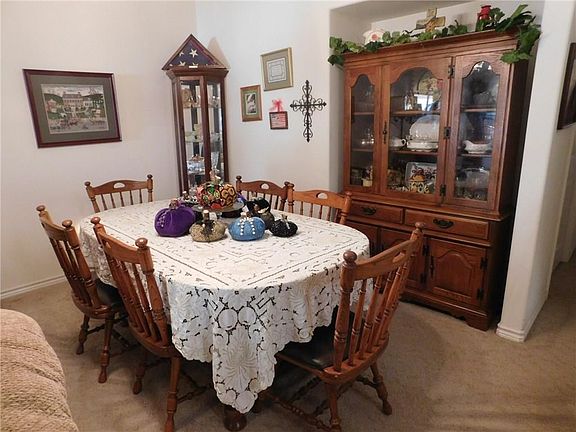 DINING AREA WITH RECESSED AREA FOR YOUR PERSONAL FURNITURE.