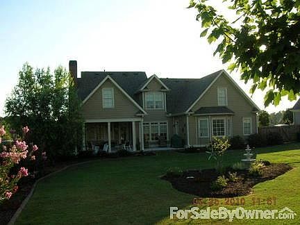 Back Yard - Covered & Open Patio
						:
						Landscaped fenced in back yard with natural areas, trees, and flowering shrubs
