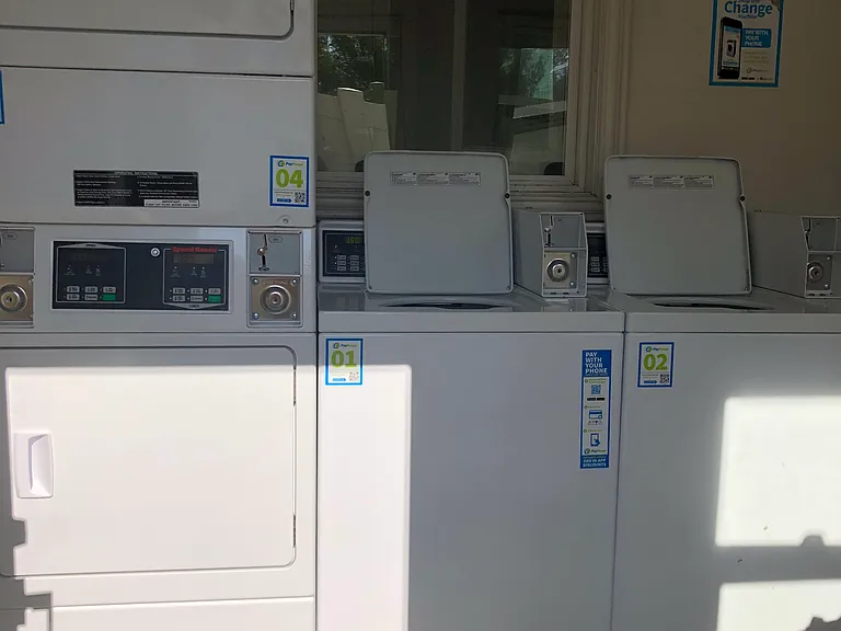 Laundry room with phone app pay
