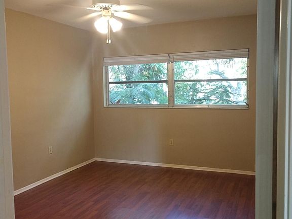 Bedroom with view of greenery