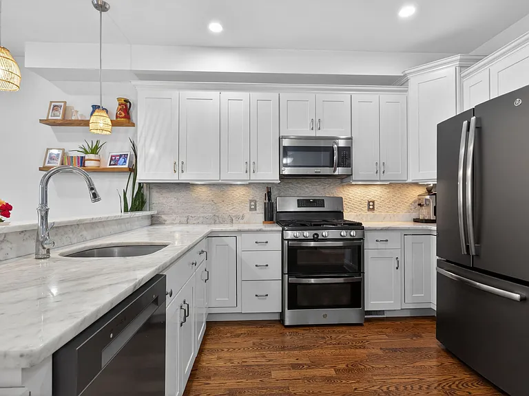 Kitchen with smudge proof stainless steel appliances