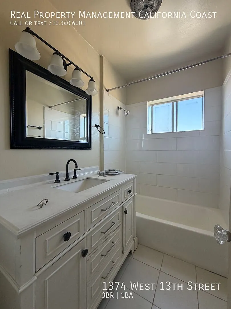 Super Spacious Updated Upstairs Apartment w/Ocean Views, Laundry Hookups & 1-Car Garage — Photo 4