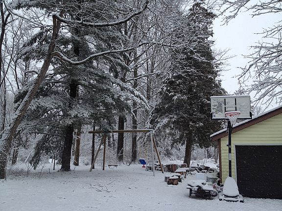 Swingset next to Garage