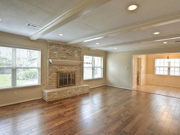 Family room has great flow with easy access to kitchen and casual dining space.