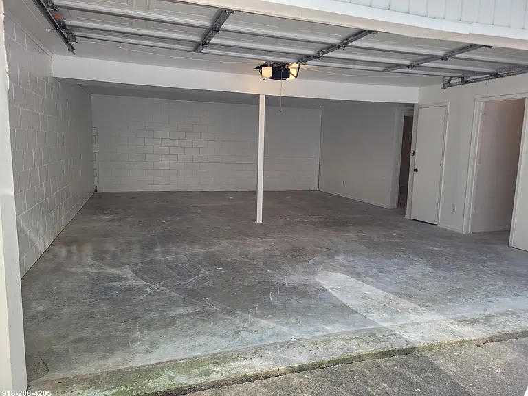 Garage: storage area #1, under the stairs storage closet, hallway with storage area #2