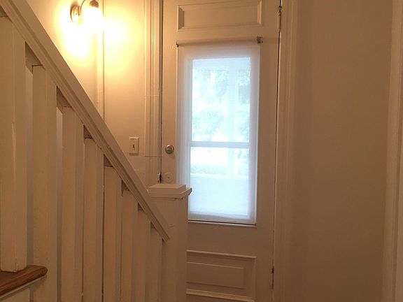 Entry way - lots of space for bikes, coat rack, shoes etc.