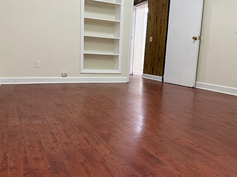 large flex space or office. you choose! built-in shelving.