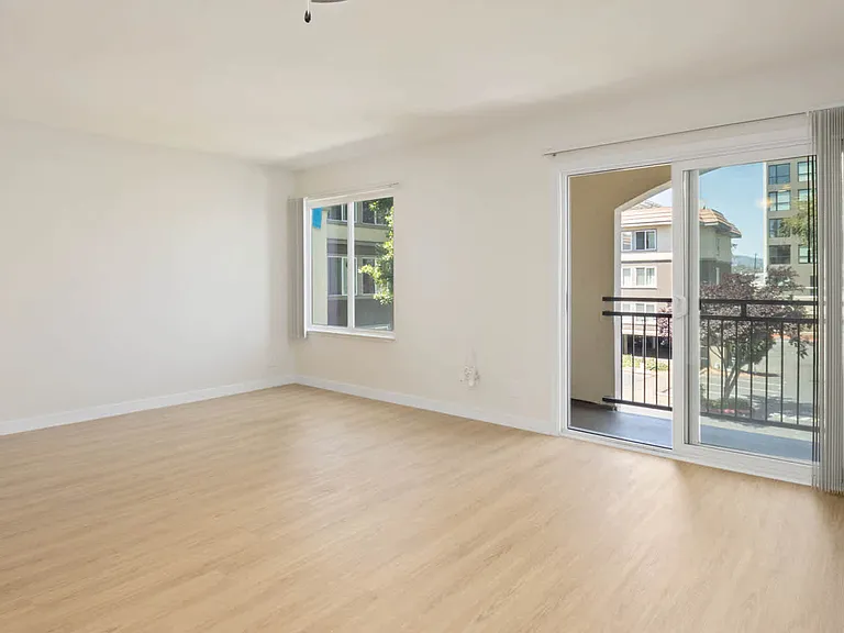 Living Room with Balcony and Hard Surface Flooring