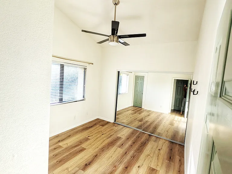Second bedroom with two closet spaces.