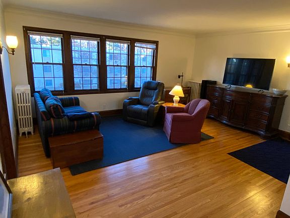 Living room, lots of light from north-facing windows.